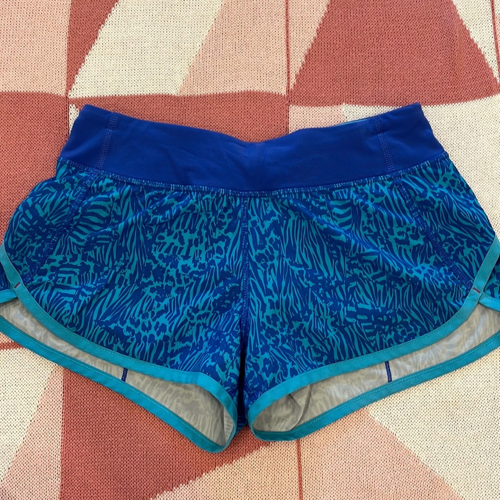 Ivivva Blue Animal Patterned Speedy shorts size 12
